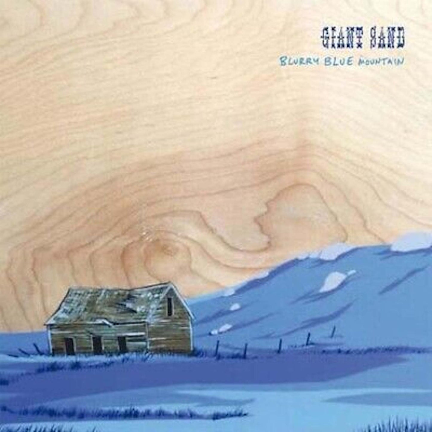 giant sand blurry blue mountain 